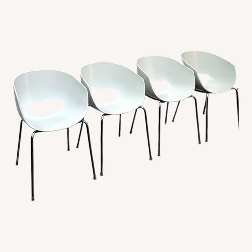 Used Vintage/Antique White Plastic Dining Chairs for sale on AptDeco