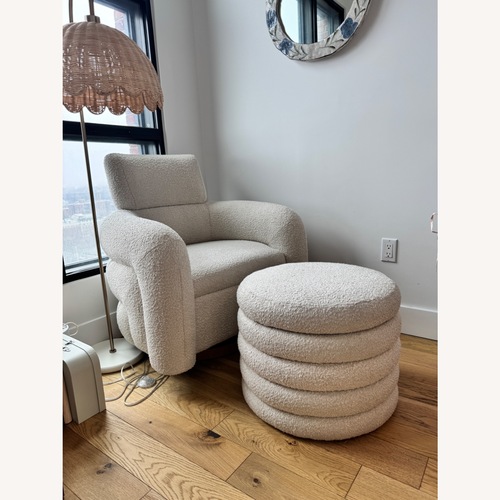 Used Crate & Barrel Cream Snoozer Boucle Nursery Glider and Ottoman for sale on AptDeco