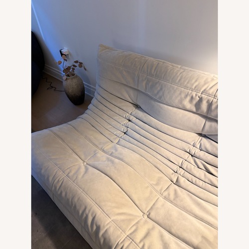 Used Ligne Roset Togo Light Gray Suede Loveseat for sale on AptDeco