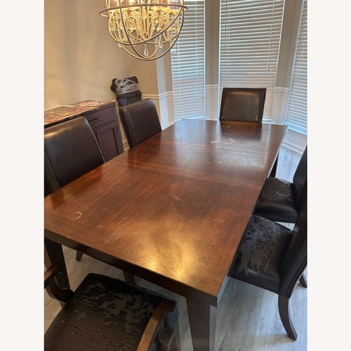 Used Havertys Dark Brown Wood Dining Table for sale on AptDeco