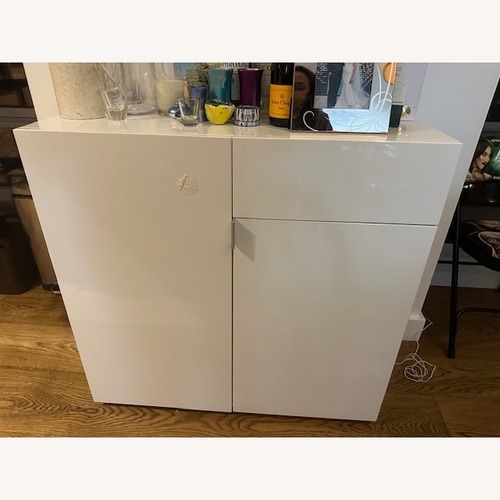 Used CB2 Swig White Lacquer Bar Storage for sale on AptDeco
