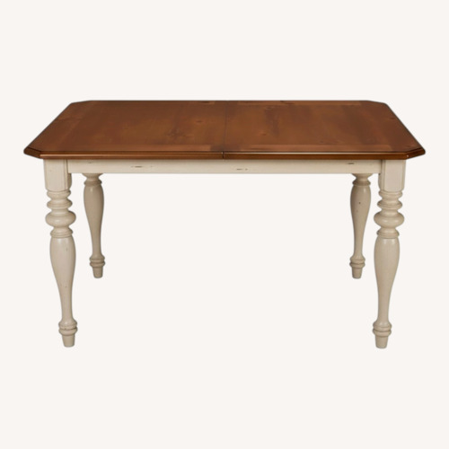 Used Raymour & Flanigan Dark Brown Wood Dining Table for sale on AptDeco