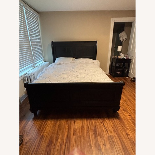 Used Ethan Allen Black Wood Queen Bed for sale on AptDeco