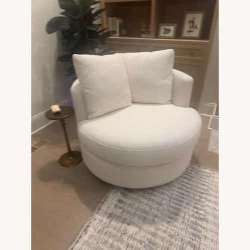 Used Pottery Barn Balboa Swivel Chair for sale on AptDeco