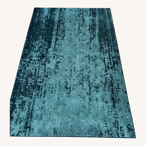 Used Angelica Green Area Rug 9' x 12' for sale on AptDeco