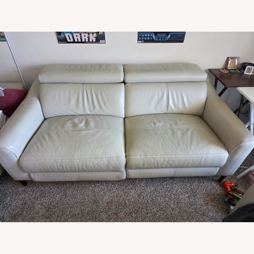 Used  Ivory Faux Leather Reclining Sofa for sale on AptDeco