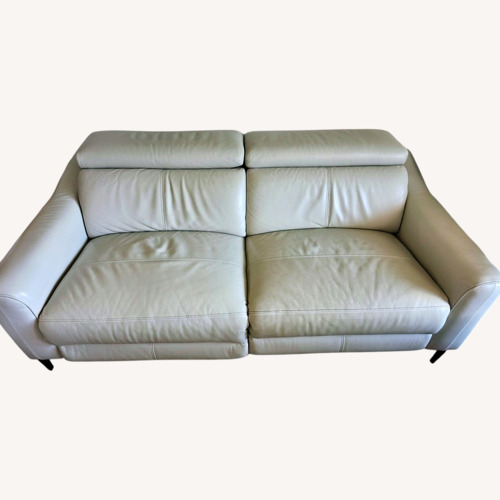 Used  Ivory Faux Leather Reclining Sofa for sale on AptDeco