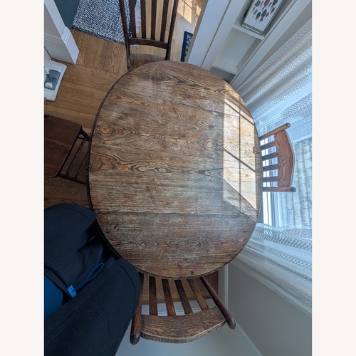 Used Solid Wood Vintage Dining Table and Chairs for sale on AptDeco