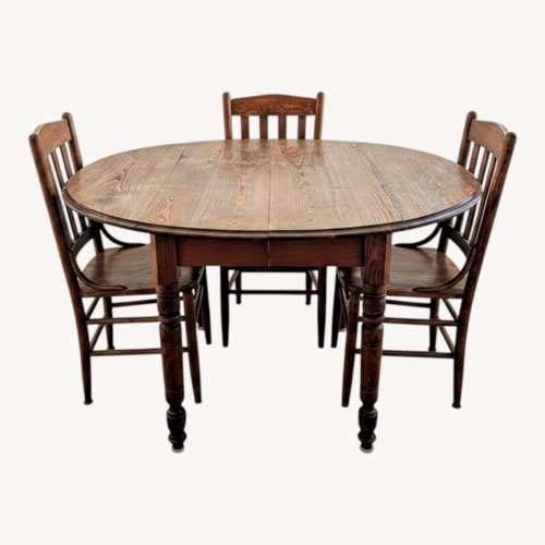 Used Solid Wood Vintage Dining Table and Chairs for sale on AptDeco