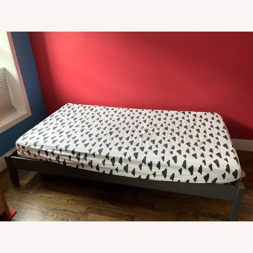 Used Dark Gray Wood Twin Bed for sale on AptDeco