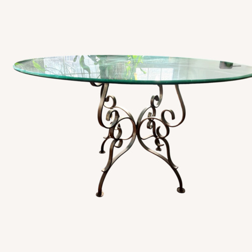 Used  Beveled Glass Top Iron Base Dining Table for sale on AptDeco