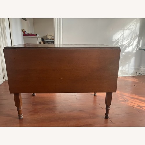 Used Antique Dining Table for sale on AptDeco