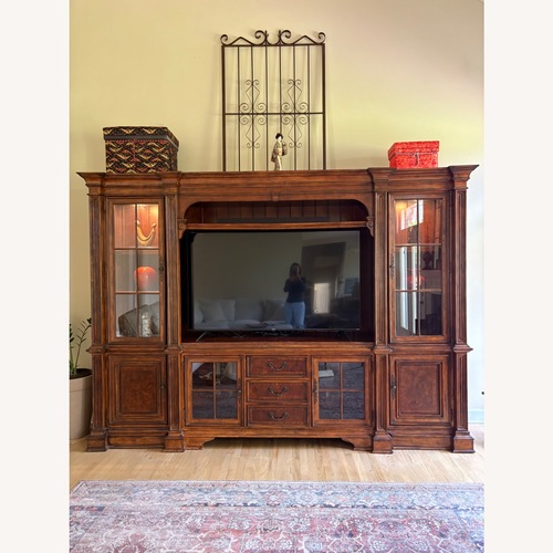 Used Dark Brown Wood Wall Unit for sale on AptDeco