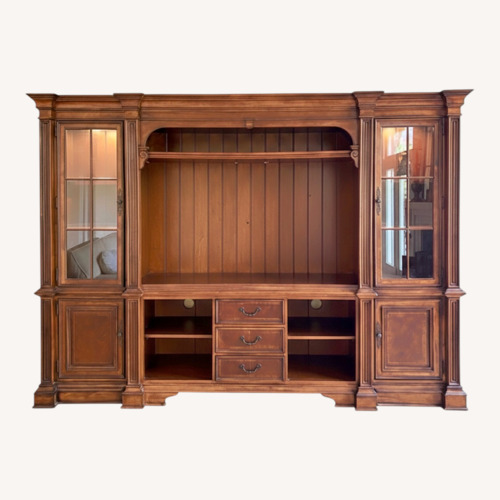 Used Dark Brown Wood Wall Unit for sale on AptDeco
