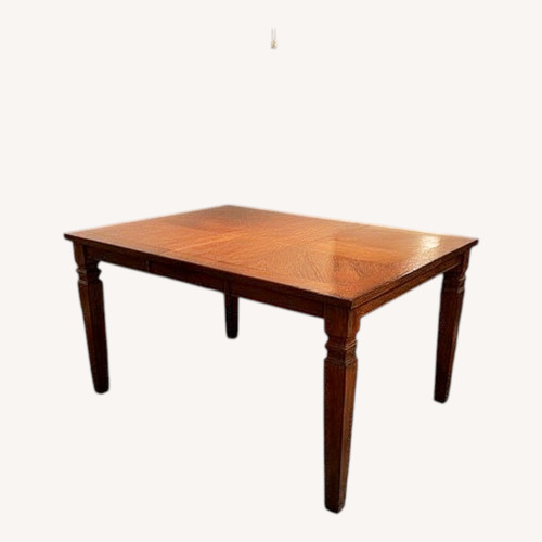 Used Ashley Furniture Dark Brown Wood Dining Table for sale on AptDeco