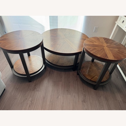 Used Ashley Roybeck 3 Piece Table Set for sale on AptDeco