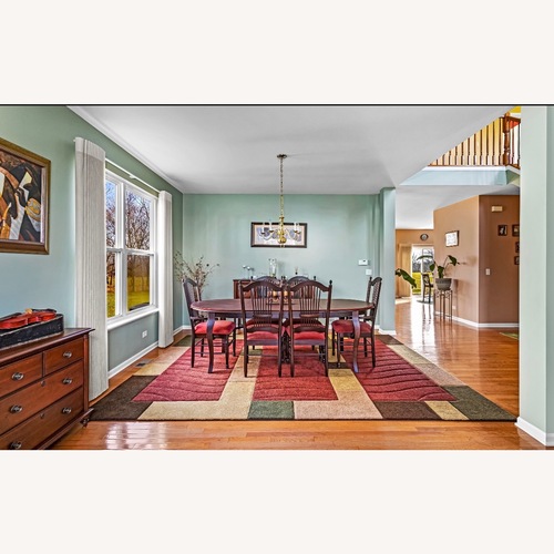 Used Walter E. Smithe Dark Brown Wood Dining Set for sale on AptDeco