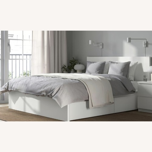 Used IKEA Modern White Queen Bed Frame with Storage for sale on AptDeco