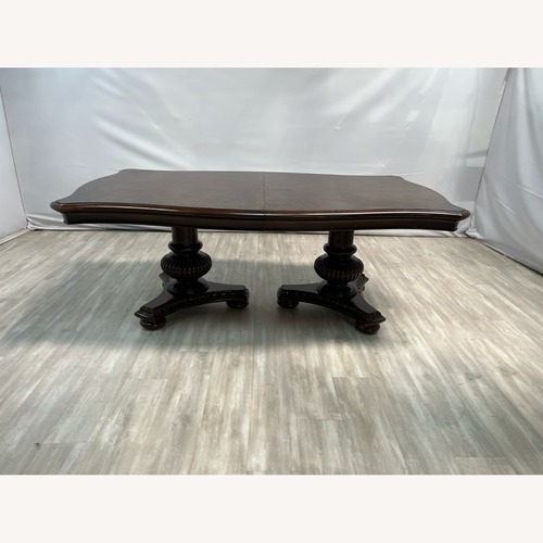 Used Raymour & Flanigan Dining Table for sale on AptDeco