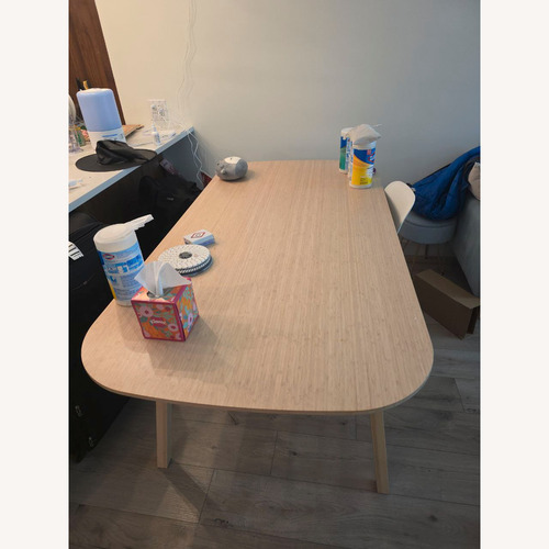 Used IKEA Voxlöv Yellow Bamboo Dining Table for sale on AptDeco