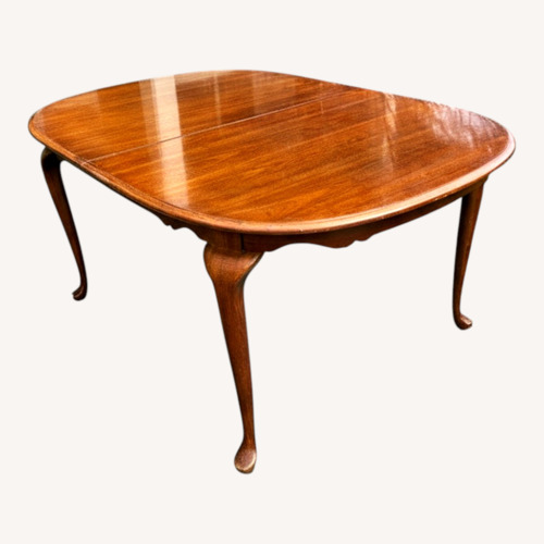 Used Extendable Broyhill Dark Brown Dining Table for sale on AptDeco