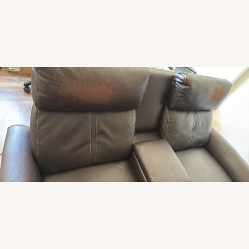 Used Functional Electric Dark Brown Leather Loveseat for sale on AptDeco