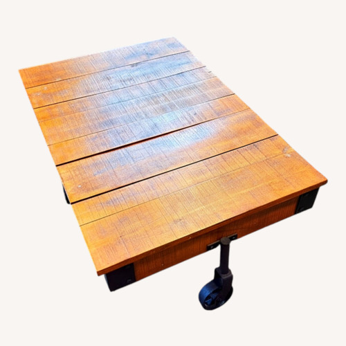 Used Rustic Vintage Industrial Wooden Coffee Table for sale on AptDeco
