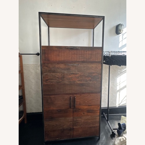 Used Crate & Barrel Clive Bar Cabinet  for sale on AptDeco