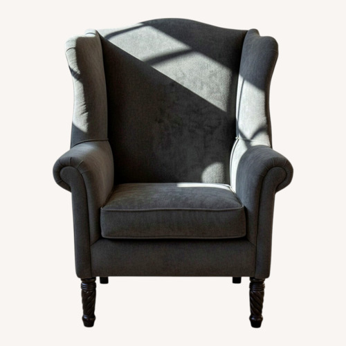 Used Antique Wingback Chair with Hand Turned Legs for sale on AptDeco