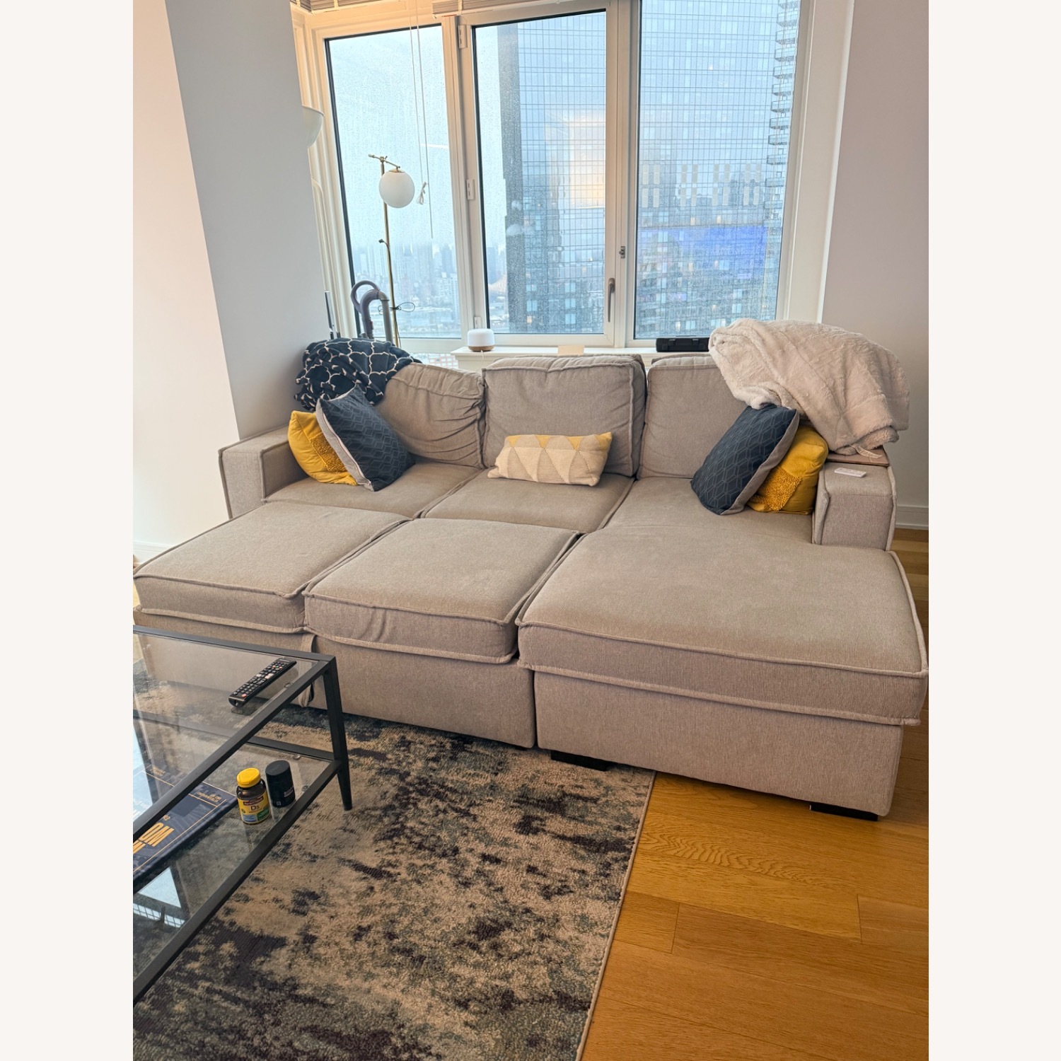 Bob's Discount Furniture Sectional into Sleeper With Storage - image-2