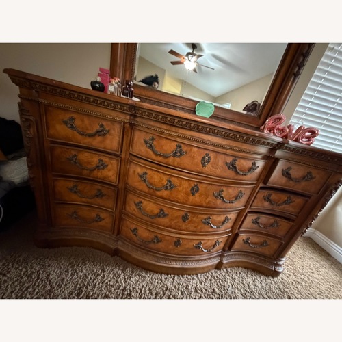 Used Vintage/Antique Dark Brown Wood Dresser for sale on AptDeco