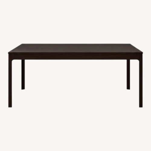 Used IKEA Dark Brown Wood Dining Table for sale on AptDeco