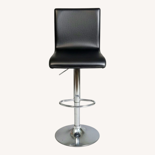 Used Black Adjustable Faux Leather Barstool with Chrome Base and Backrest for sale on AptDeco