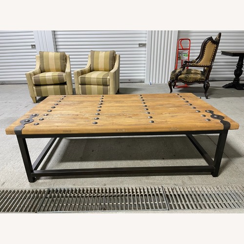 Used Industrial Barn Door & Metal Base Coffee Table for sale on AptDeco