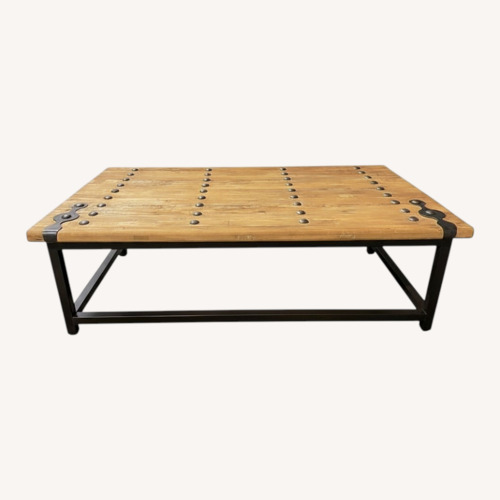 Used Industrial Barn Door & Metal Base Coffee Table for sale on AptDeco