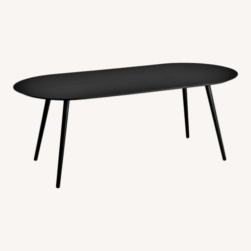Used Article Ballo Black Aluminum Dining Table for sale on AptDeco