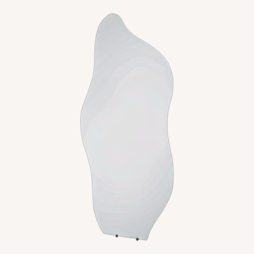 Used Wavy Glass Wall Mirror for sale on AptDeco