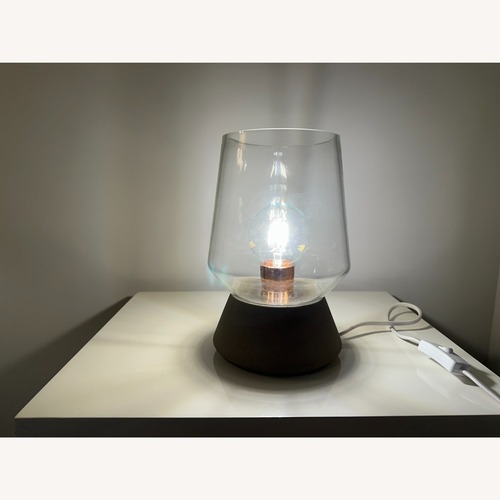 Used Anthropologie Modern Glass/Concrete Table Lamp for sale on AptDeco