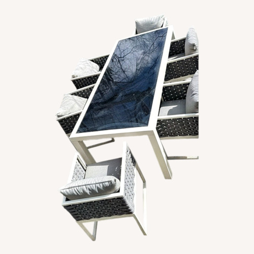 Used Contemporary Outdoor Dining Table with 6 Chairs for sale on AptDeco