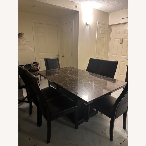 Used Dining tTable With 6 Chairs  for sale on AptDeco