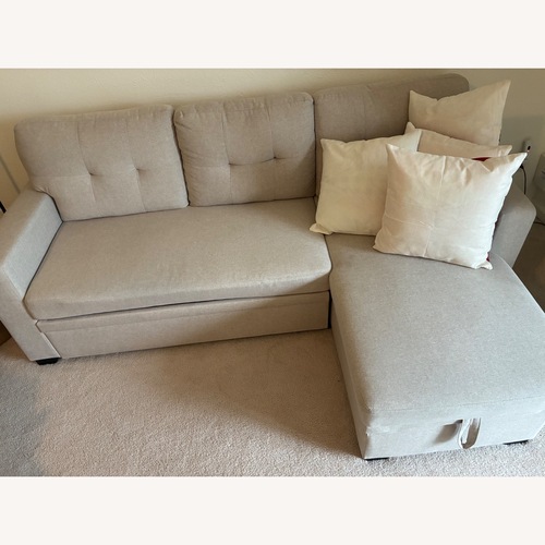 Used 2 Piece Sectional -Opens to Twin Sleeper  for sale on AptDeco