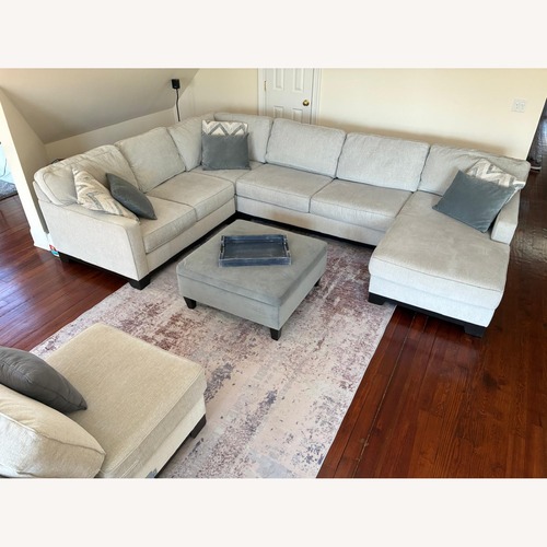 Used Raymour & Flanigan Arlo Gray Sectional + Ottoman  for sale on AptDeco