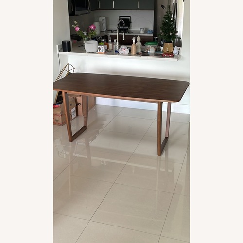 Used Mercury Row Mukai Dark Brown Wood Dining Table for sale on AptDeco