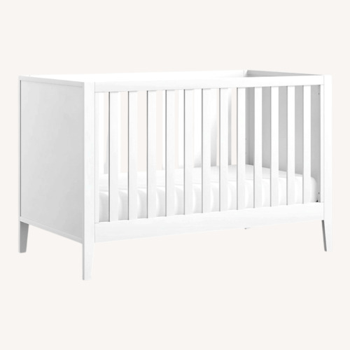 Used Crate & Barrel Ever Simple White Wood Convertible Baby Crib with Toddler Bed Rail for sale on AptDeco