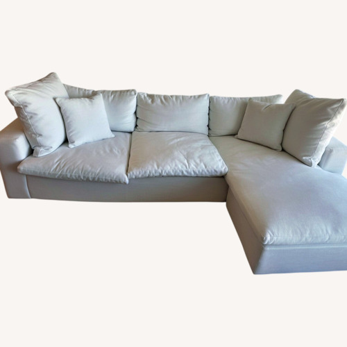 Used Living Spaces White Cozy Sectional Sofa for sale on AptDeco