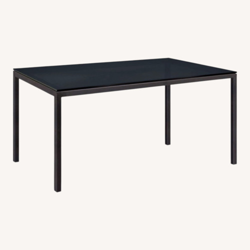 Used Room & Board Parsons Black Glass Dining Table for sale on AptDeco