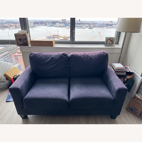Used Ashley Furniture Blue Loveseat for sale on AptDeco