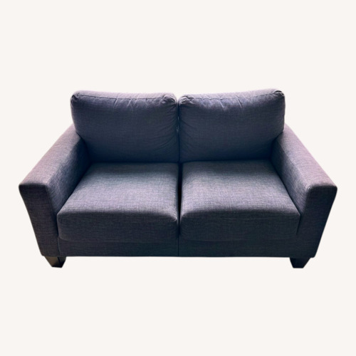 Used Ashley Furniture Blue Loveseat for sale on AptDeco