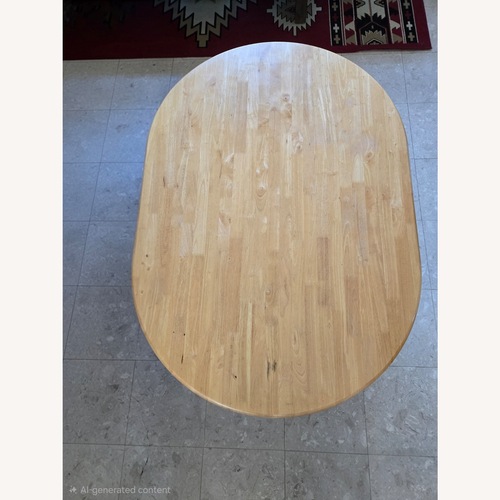 Used Ashley Furniture Natural Wood Dining Table for sale on AptDeco