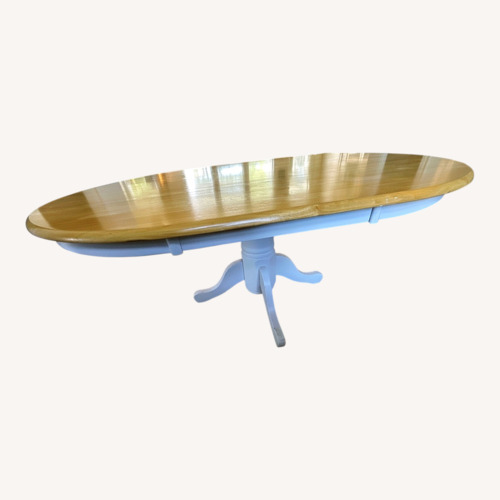 Used Ashley Furniture Natural Wood Dining Table for sale on AptDeco